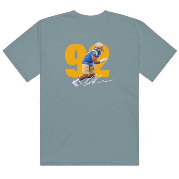 A t-shirt with a picture of a man in blue and yellow.