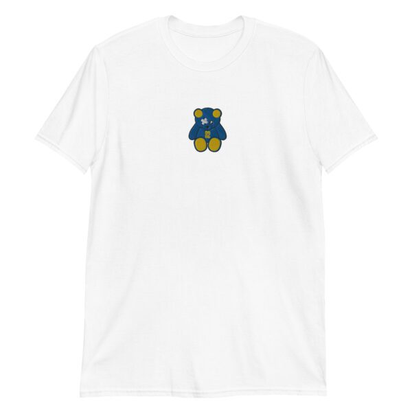 A white t-shirt with a blue and yellow teddy bear on it.