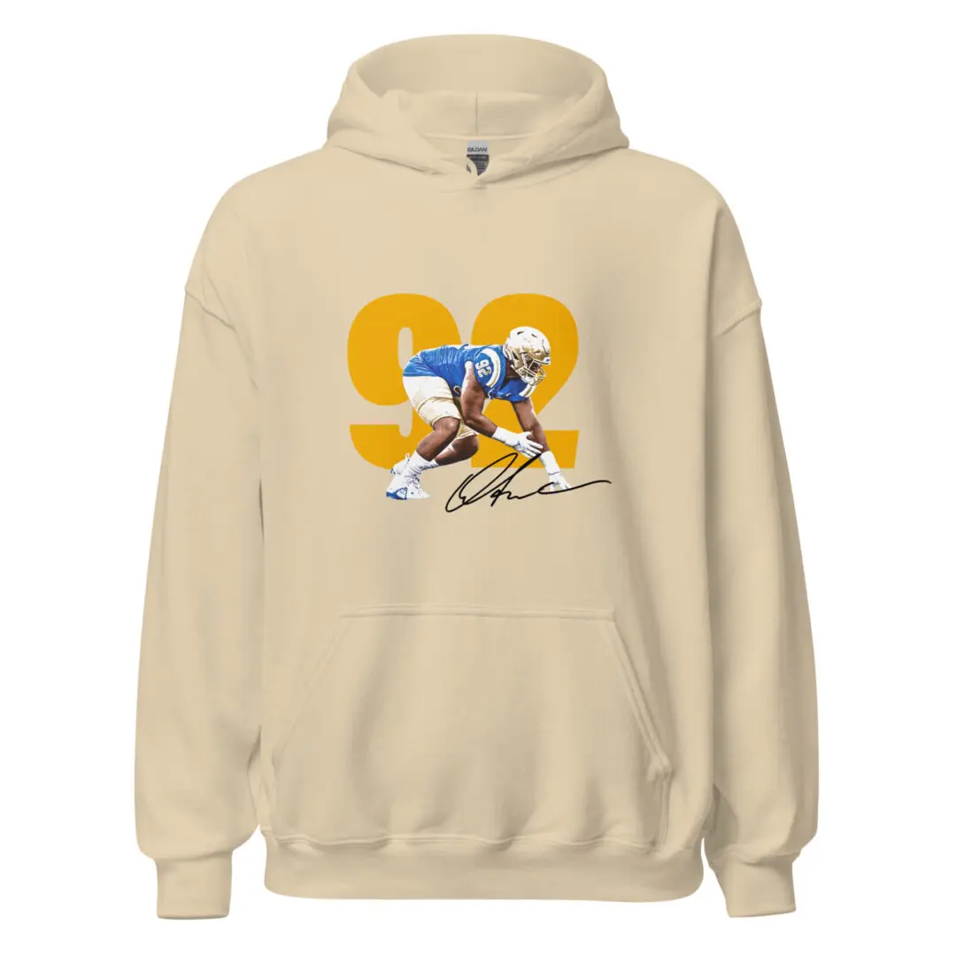 A tan hoodie with an image of a football player.