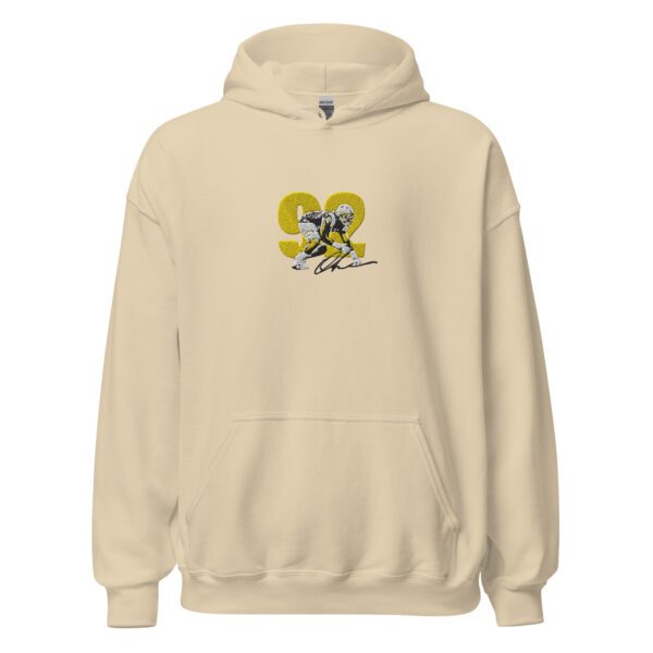 A beige hoodie with a picture of a person on it.