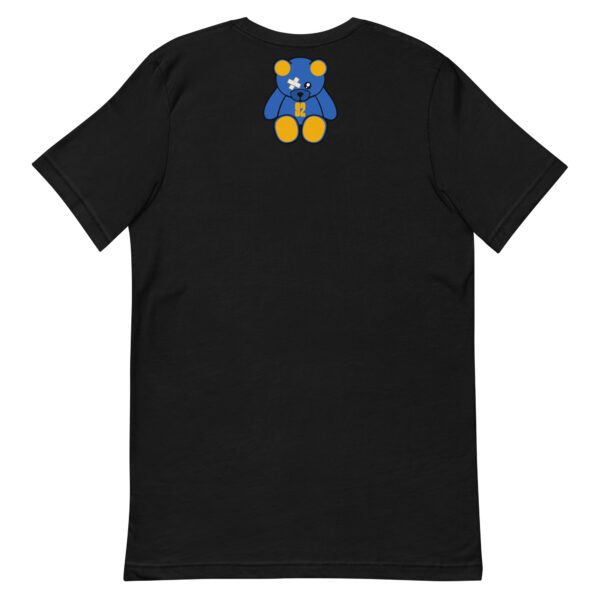 A black t-shirt with a blue and yellow teddy bear on the back.