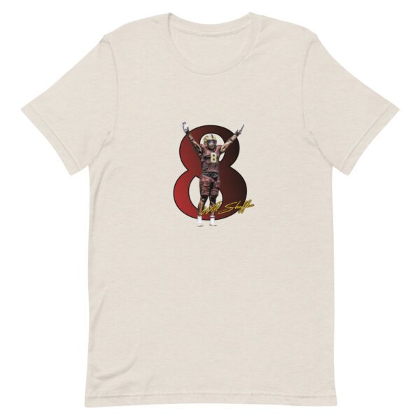 A t-shirt with an image of a dog on it.